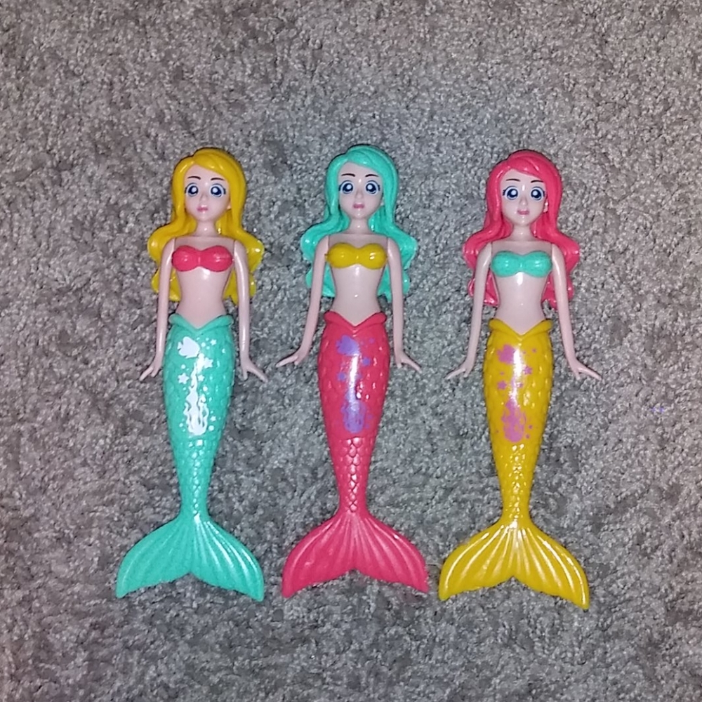 3 toy mermaids
